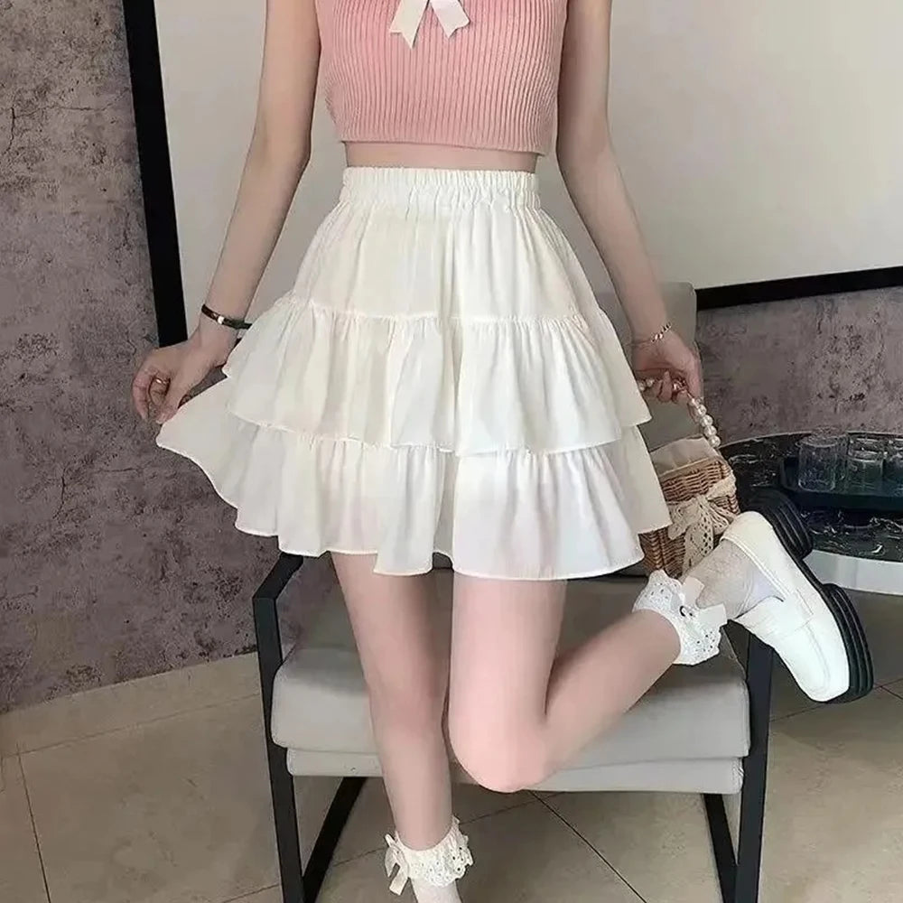 Jupe trapèze plissée blanche pour femmes, à volants, Style Preppy, taille élastique, Slim, Simple, décontracté, vente en gros, été