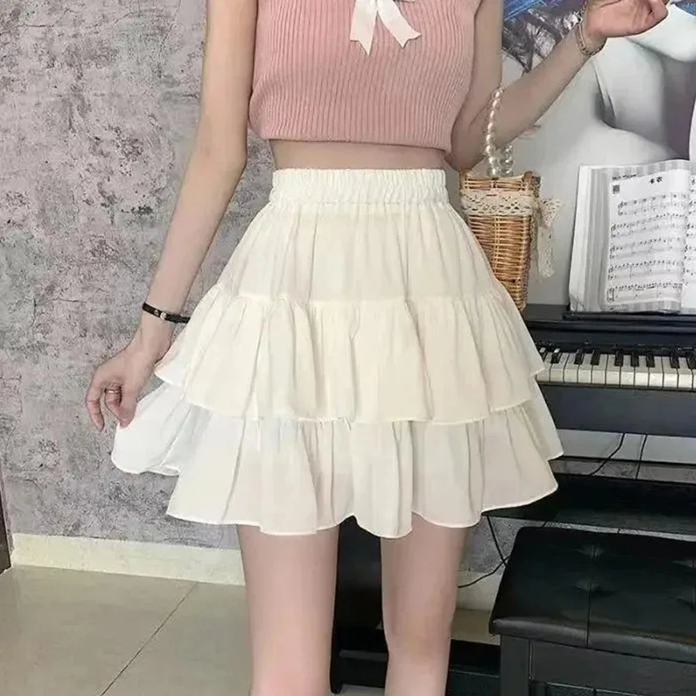 Jupe trapèze plissée blanche pour femmes, à volants, Style Preppy, taille élastique, Slim, Simple, décontracté, vente en gros, été