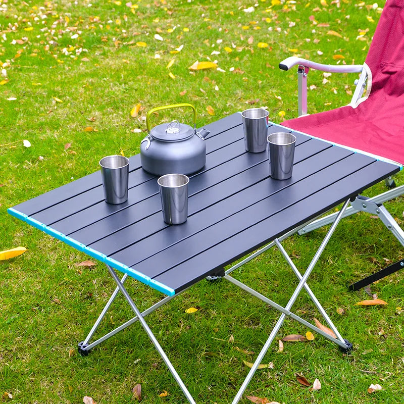 Table de camping pliante ultralégère et portable, idéale pour les repas en plein air, en alliage d'aluminium haute résistance, pour les fêtes dans le jardin, les pique-niques et les barbecues.