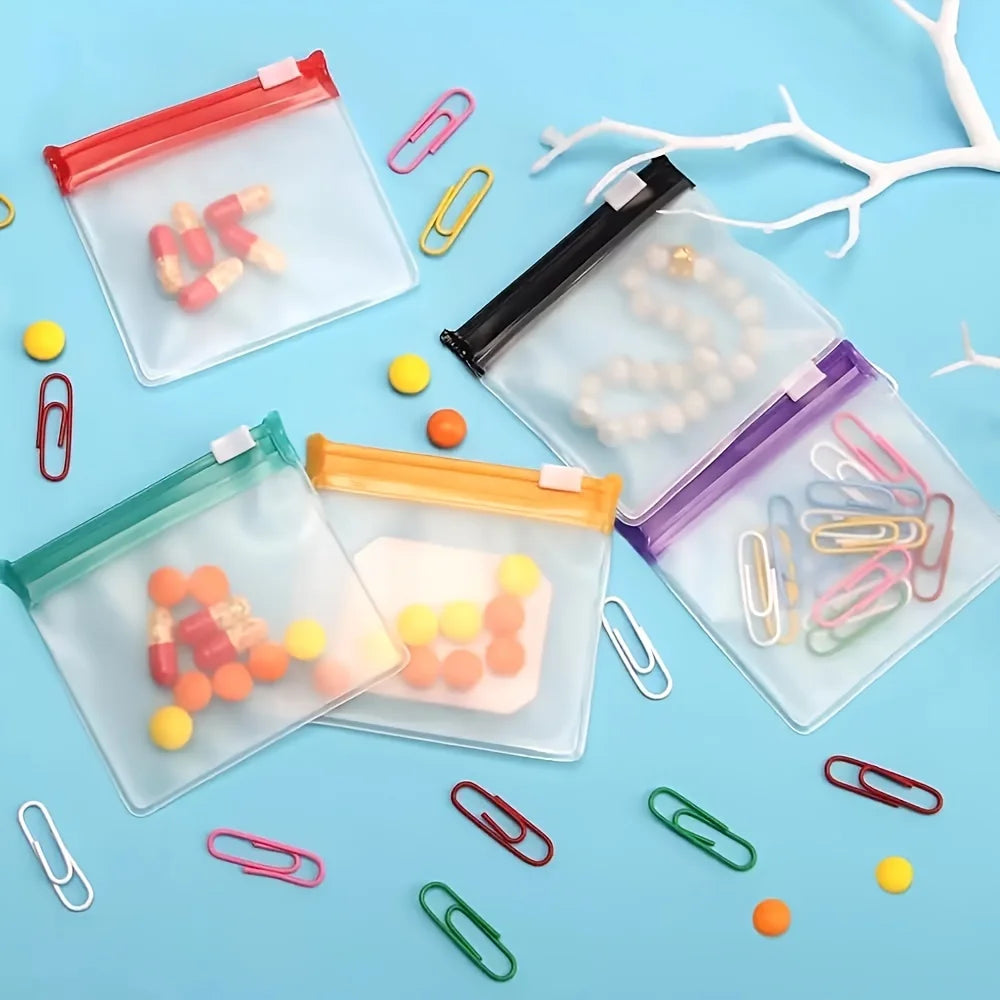 Sacs à pilules 7 pièces, ensemble de pochettes à pilules réutilisables à fermeture éclair, organisateur de médicaments 7 couleurs auto-scellantes, sacs à médicaments translucides Trave