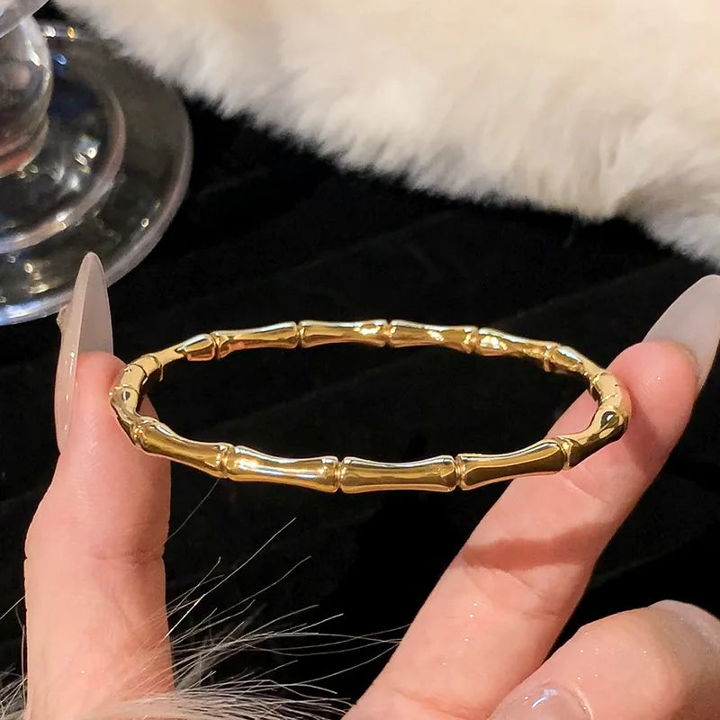1 bracelet plaqué or en acier inoxydable et titane incrusté de zircon, style classique et simple, adapté à un usage quotidien pour femme