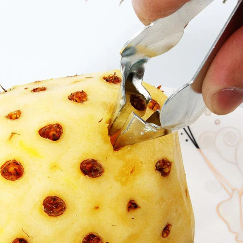Nouvel outil de cuisine pratique et créatif en acier inoxydable pour peler les yeux et les graines d'ananas, avec pince intégrée