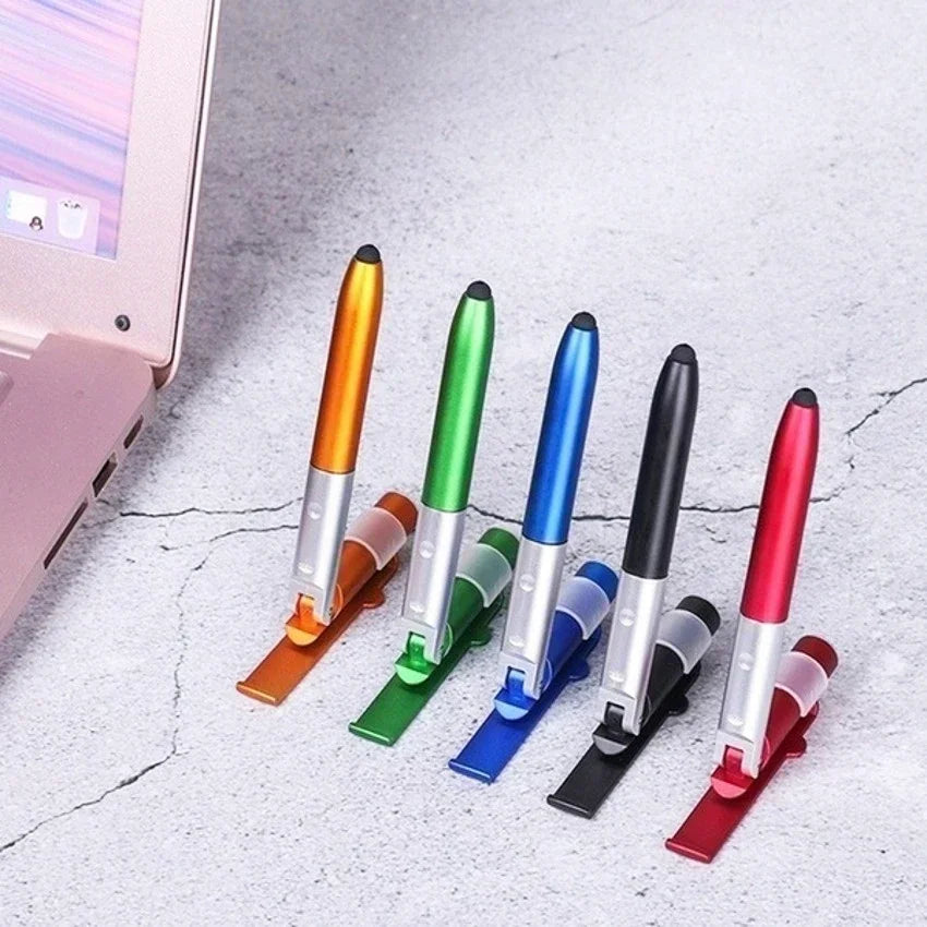 Stylo à bille multifonction 4 en 1 avec lumière LED, support de téléphone pliable, crayon d'écriture de lecture nocturne, papeterie de bureau et d'étudiant