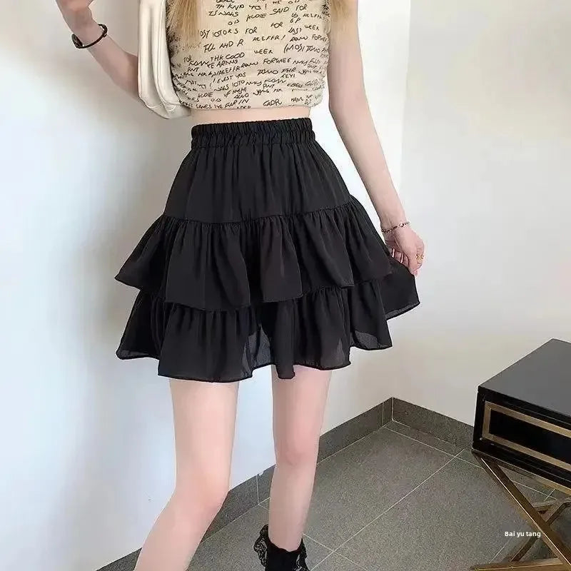 Jupe trapèze plissée blanche pour femmes, à volants, Style Preppy, taille élastique, Slim, Simple, décontracté, vente en gros, été