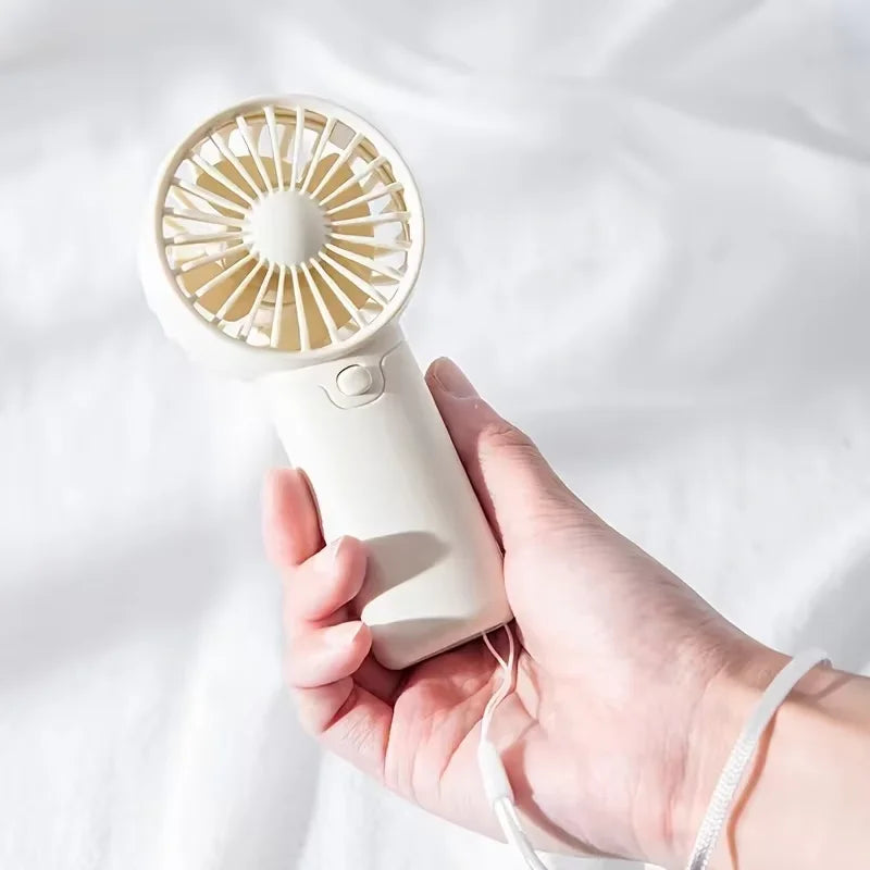 2026 New Model Noise Free Rechargeable Mini Fan for Silent Cooling Experience Lightweight Portable Mini Pocket Fan White Fan