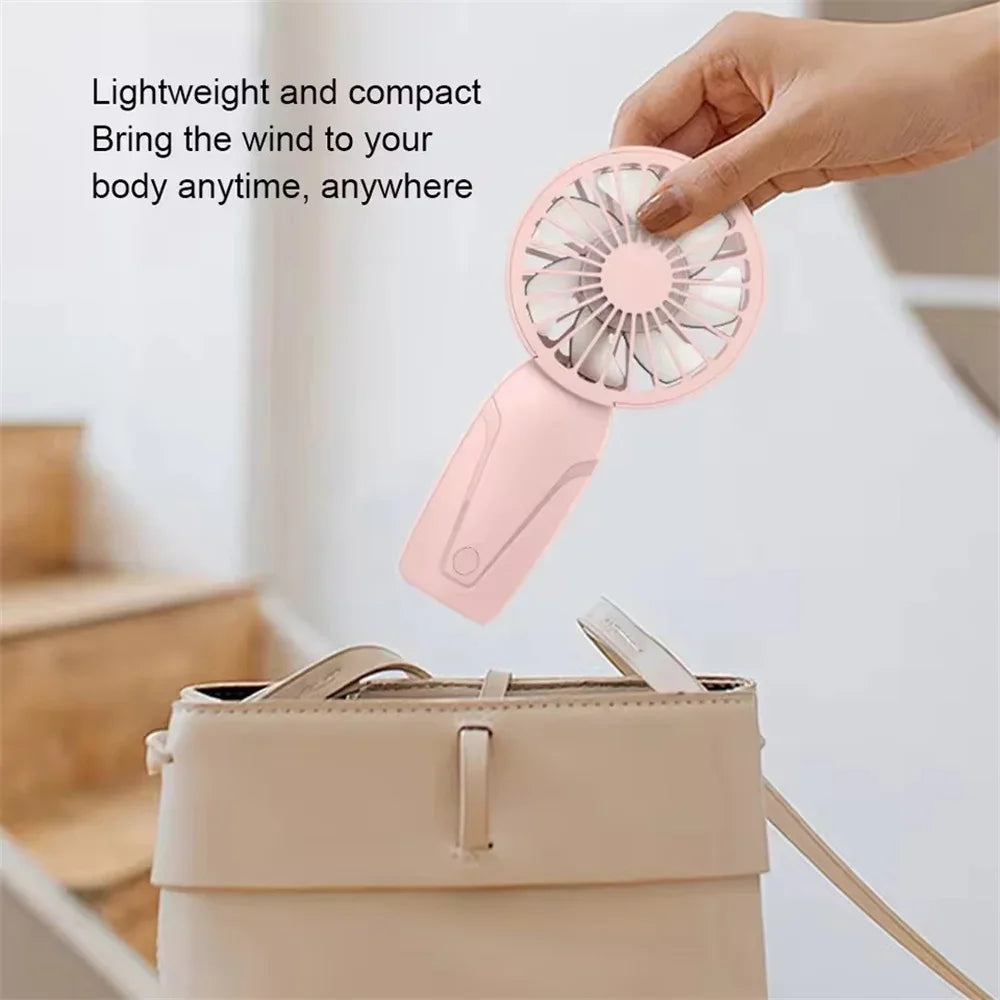 2026 New Model Noise Free Rechargeable Mini Fan for Silent Cooling Experience Lightweight Portable Mini Pocket Fan White Fan