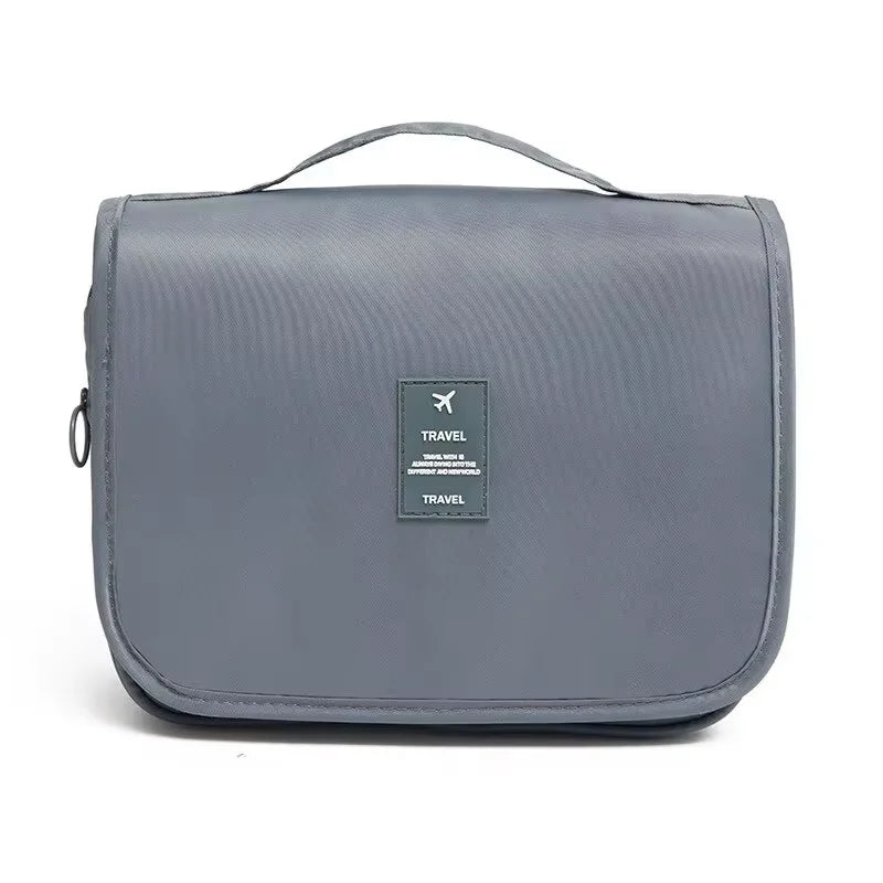 Un sac de voyage multifonctionnel qui peut être suspendu avec séparation sèche et humide, une trousse de toilette et de rangement à main, un ensemble